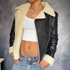 Black and cream faux leather jacket